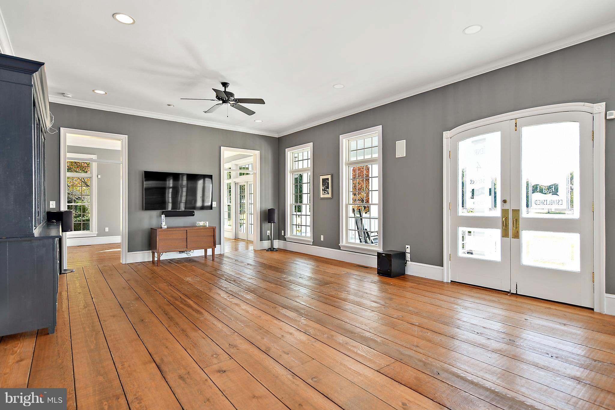34645 Winding Road Frankford, DE 19945 - Photo 19 of 111 Family room with french doors to wrap around porch