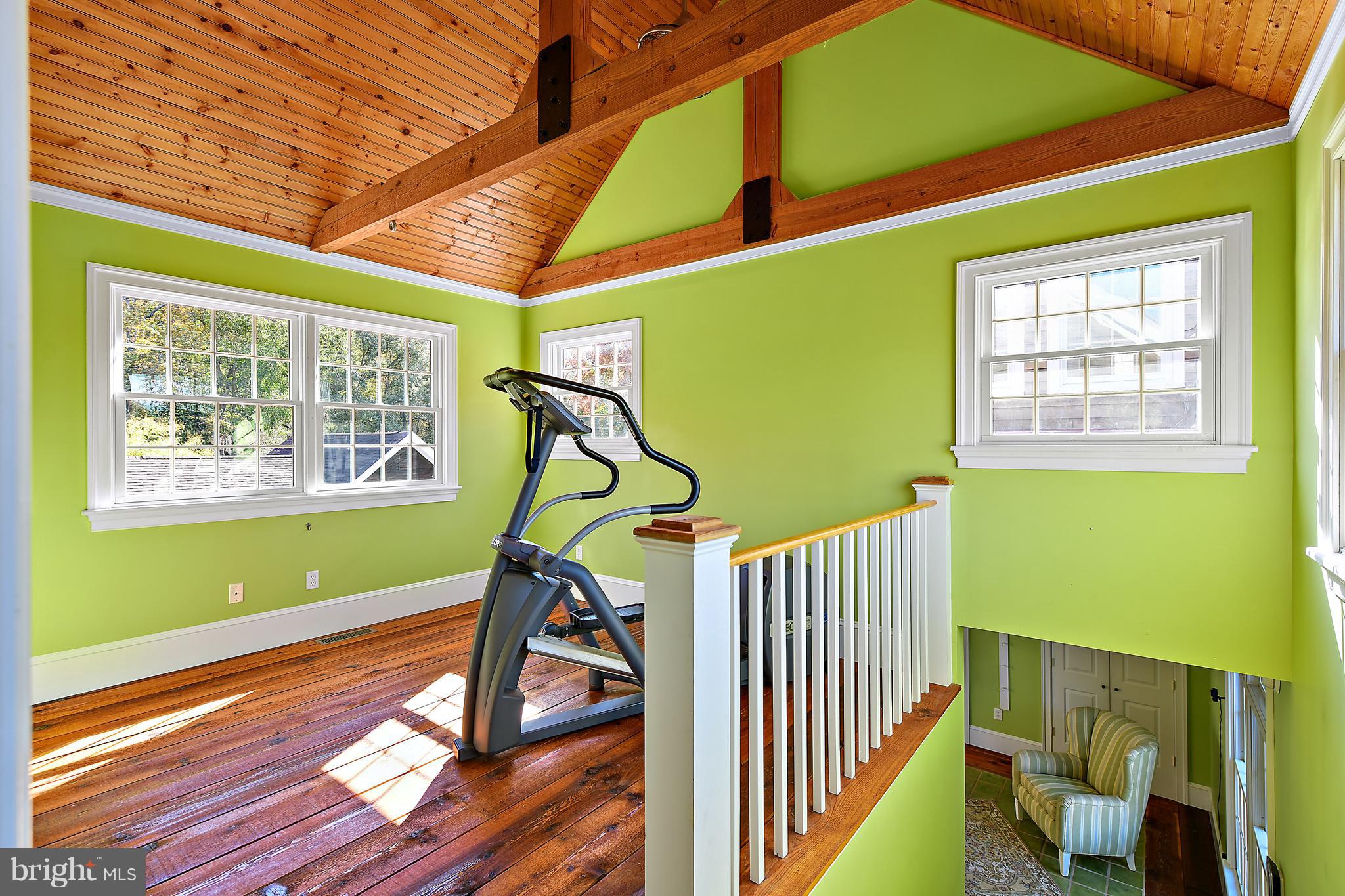 34645 Winding Road Frankford, DE 19945 - Photo 30 of 111 Work out area with exposed beams and wood floors