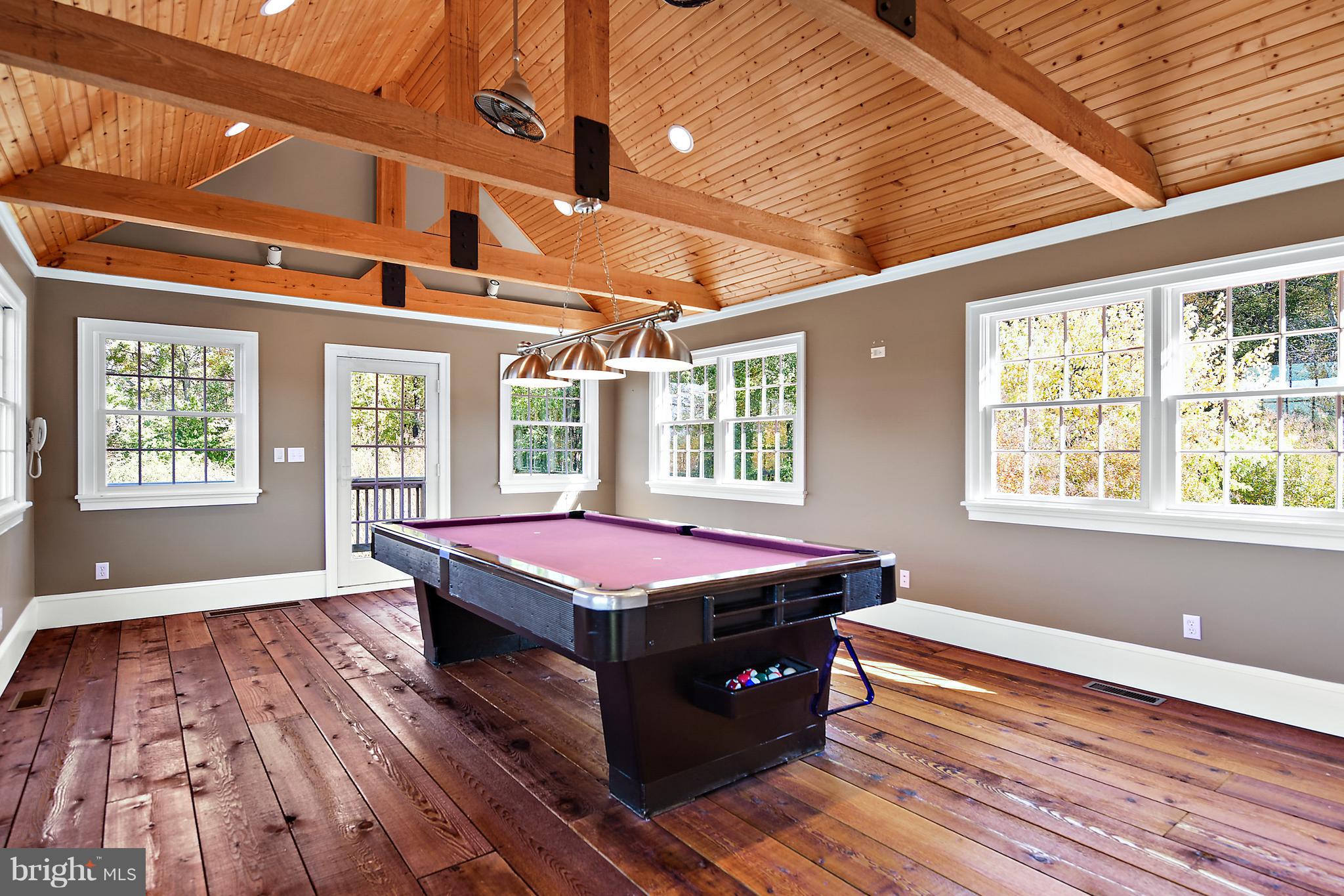 34645 Winding Road Frankford, DE 19945 - Photo 31 of 111 Game room with exposed beams and crown molding