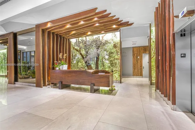 a view of backyard with patio