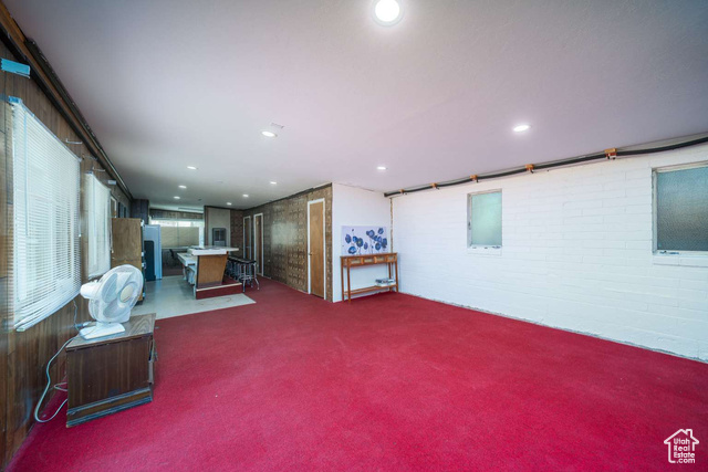 52 South Main Street Paris, ID 83261 - Photo 24 of 27 Basement with carpet, brick wall, and recessed lighting
