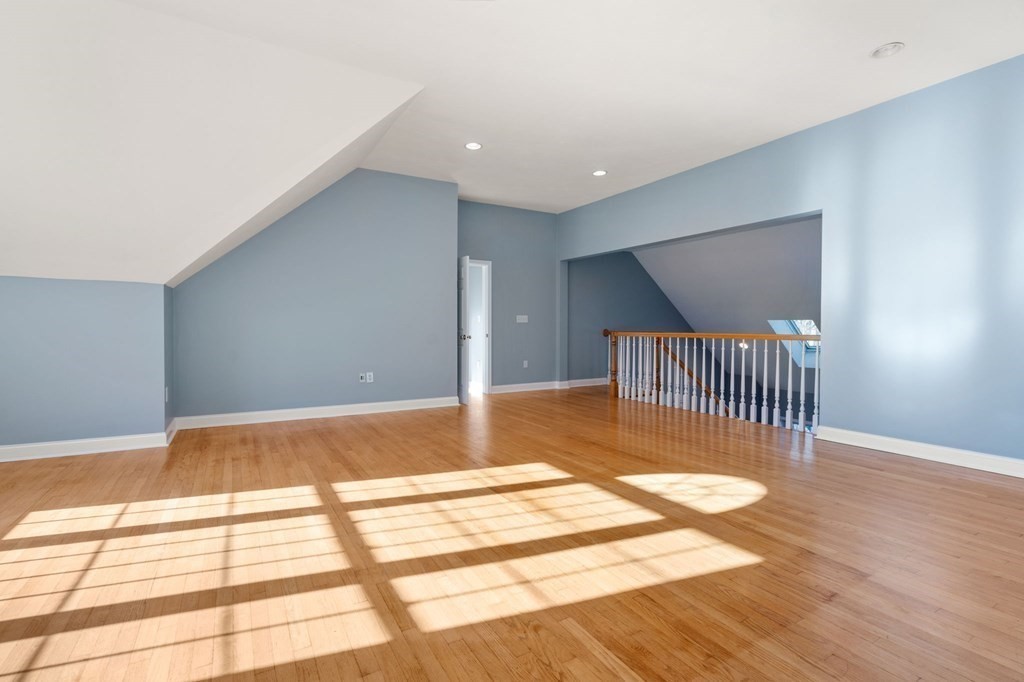 41 Mockingbird Hill Road Windham, NH 03087 - Photo 18 of 36 a view of a room with wooden floor and a potted plant