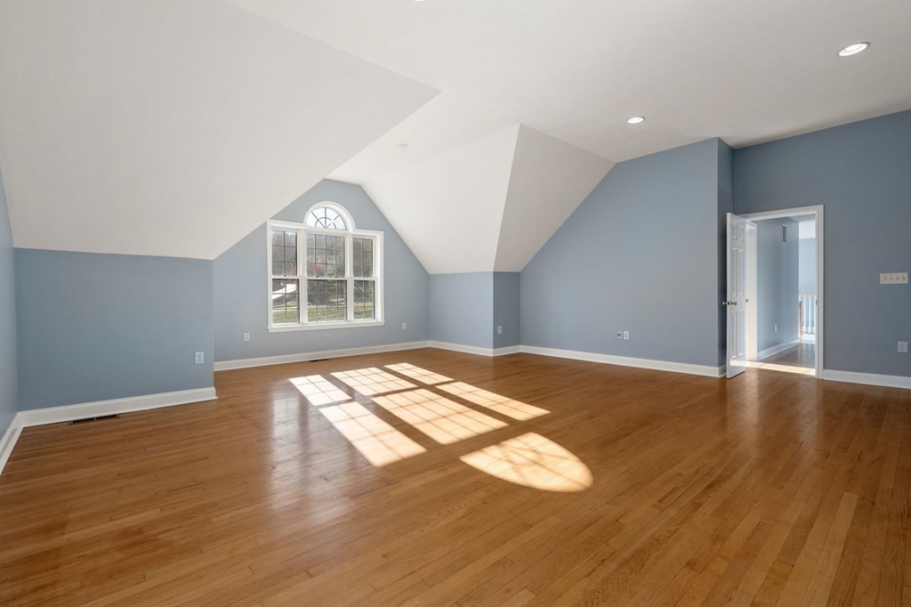 41 Mockingbird Hill Road Windham, NH 03087 - Photo 20 of 36 a view of empty room with wooden floor and fan