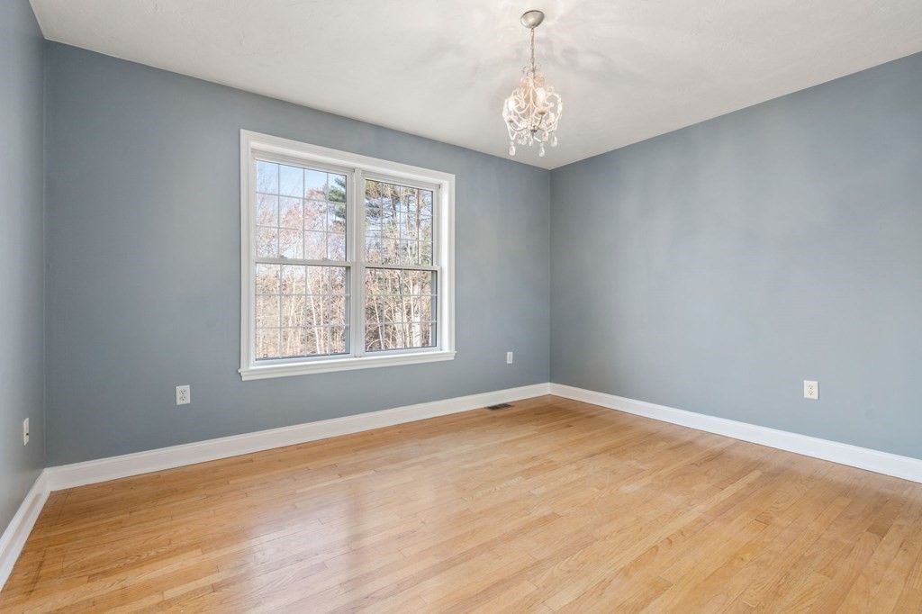 41 Mockingbird Hill Road Windham, NH 03087 - Photo 23 of 36 a view of an empty room with a window