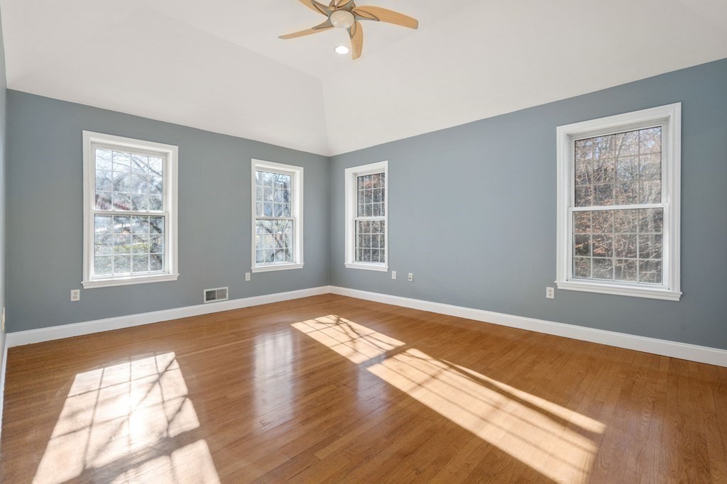 41 Mockingbird Hill Road Windham, NH 03087 - Photo 24 of 36 a view of an empty room with a window and wooden floor