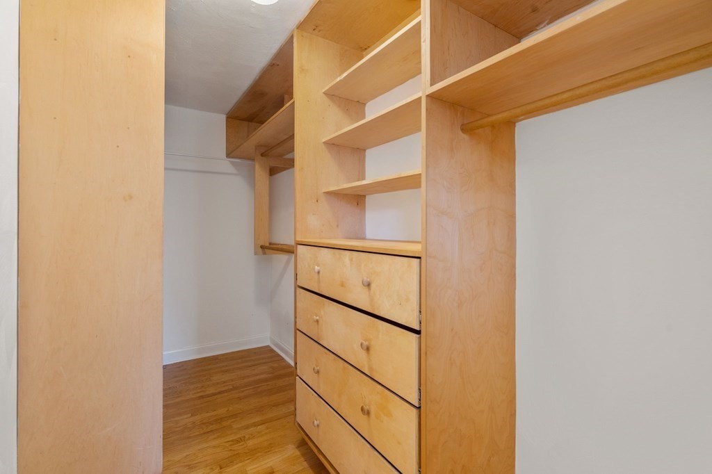 41 Mockingbird Hill Road Windham, NH 03087 - Photo 26 of 36 a view of walk in closet with empty racks
