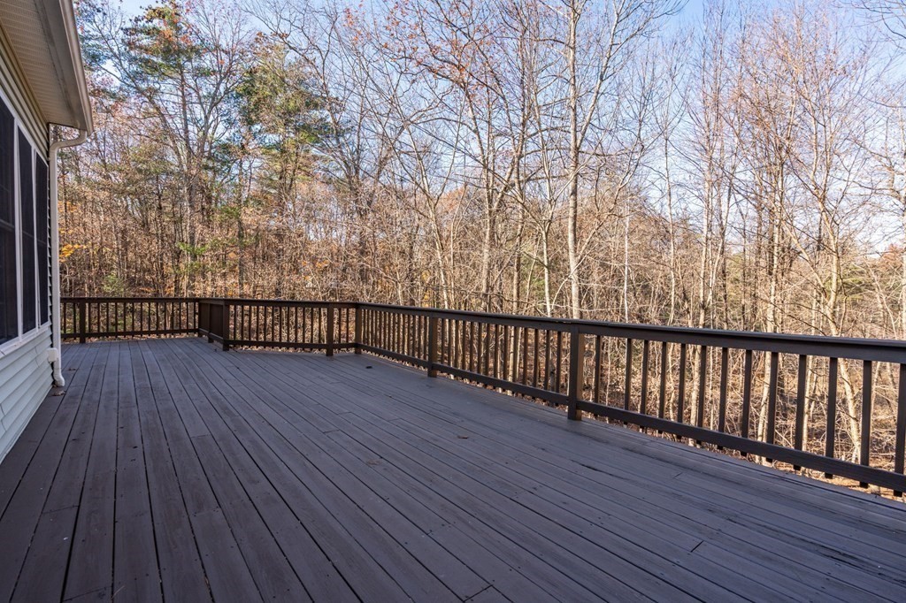 41 Mockingbird Hill Road Windham, NH 03087 - Photo 30 of 36 a view of deck with wooden floor and fence