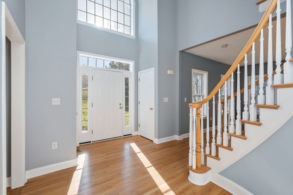 41 Mockingbird Hill Road Windham, NH 03087 - Photo 3 of 36 a view of an entryway with wooden floor