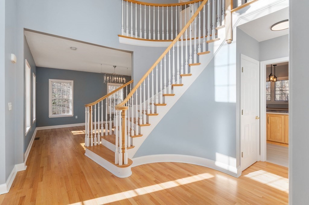 41 Mockingbird Hill Road Windham, NH 03087 - Photo 4 of 36 a view of entryway and hall with wooden floor