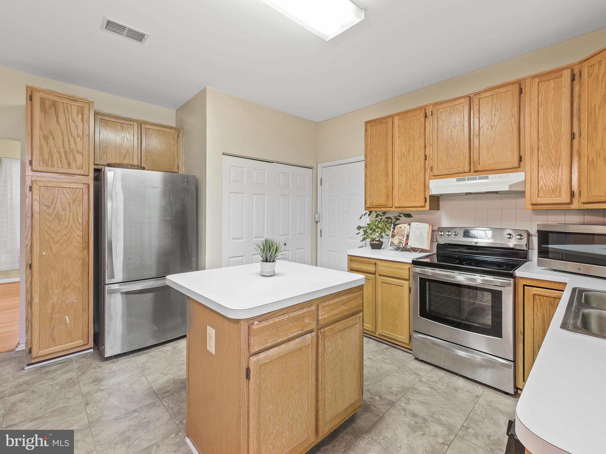 1361 Old Water Oak Point Road Pasadena, MD 21122 - Photo 15 of 41 Kitchen with center island