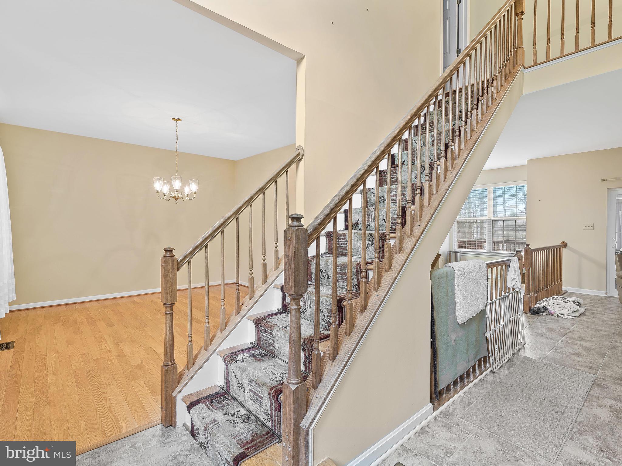 1361 Old Water Oak Point Road Pasadena, MD 21122 - Photo 3 of 41 Open foyer leading to dining room