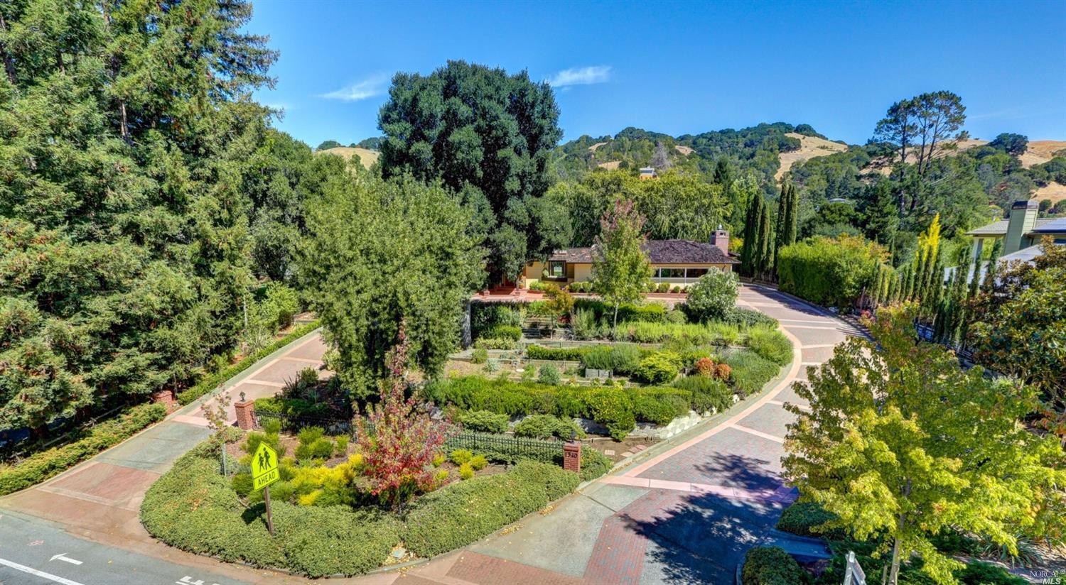 1340 Butterfield Road San Anselmo, CA 94960 - Photo 1 of 1 a view of a garden with a house