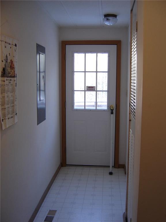 1069 North Berwick Road Wells, ME 04090 - Photo 18 of 32 BACK HALLWAY EXIT TO DECK