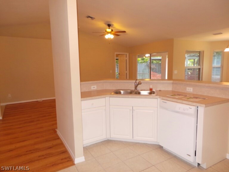 17448 Lee Road Fort Myers, FL 33967 - Photo 8 of 20 a bathroom with a sink and a mirror