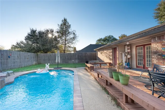 a backyard of a house with seating space