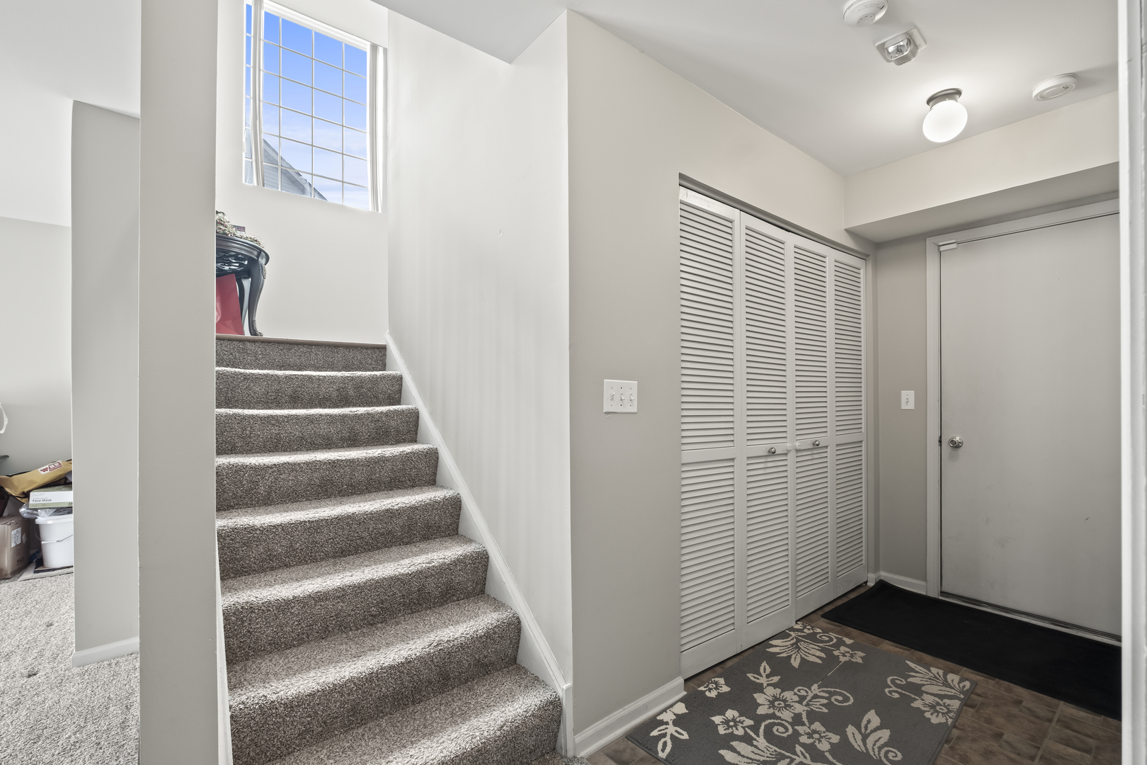 7917 Windsor Drive Darien, IL 60561 - Photo 19 of 31 a view of an entryway with staircase