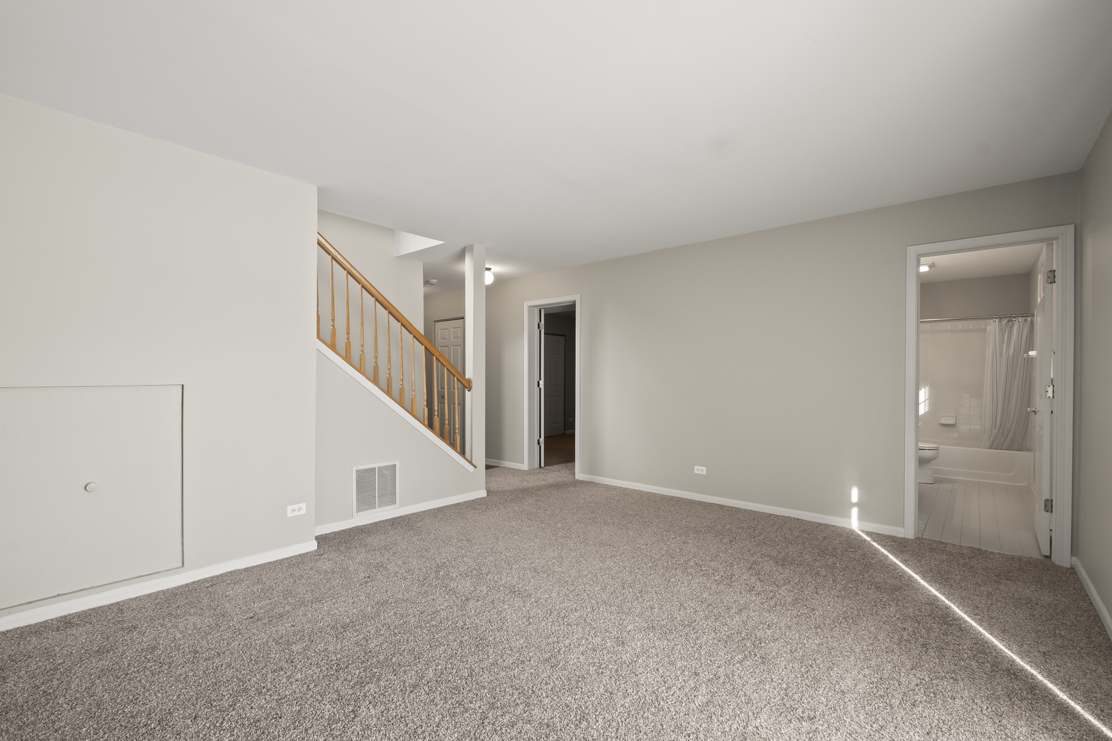 7917 Windsor Drive Darien, IL 60561 - Photo 20 of 31 a view of an empty room with closet and wooden floor