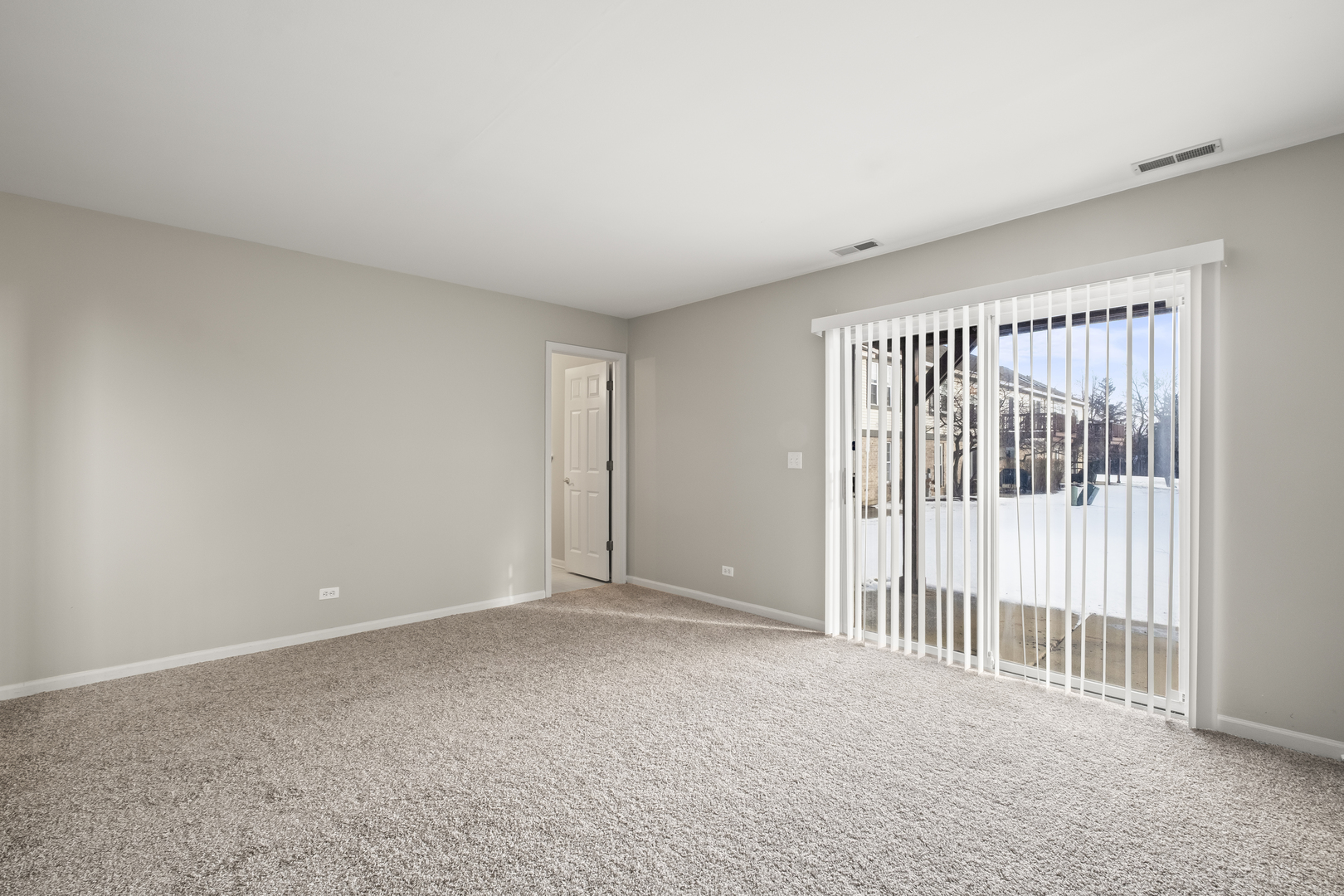 7917 Windsor Drive Darien, IL 60561 - Photo 22 of 31 a view of an empty room with a window