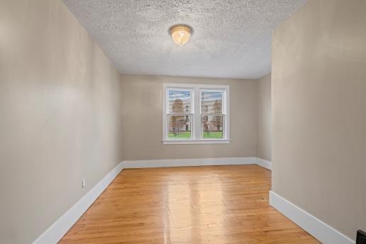 1611 Roemer Boulevard Farrell, PA 16121 - Photo 18 of 35 a view of a room with blue walls and a window