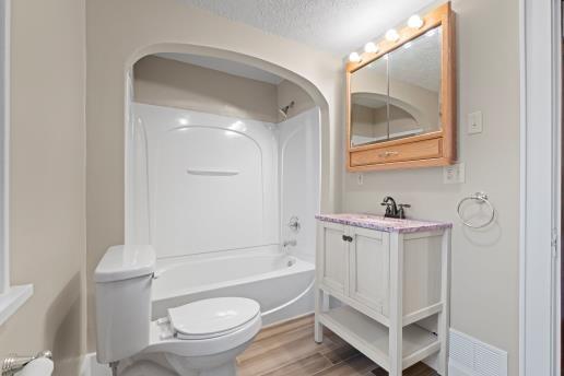 1611 Roemer Boulevard Farrell, PA 16121 - Photo 19 of 35 a bathroom with a sink a toilet and shower