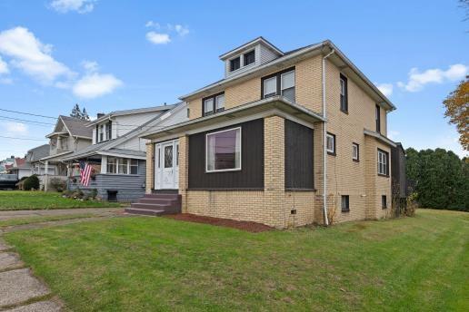1611 Roemer Boulevard Farrell, PA 16121 - Photo 2 of 35 a front view of a house with a yard