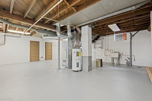 1611 Roemer Boulevard Farrell, PA 16121 - Photo 23 of 35 a view of water heater room with refrigerator