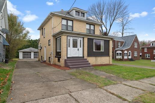 1611 Roemer Boulevard Farrell, PA 16121 - Photo 30 of 35 a front view of a house with garden