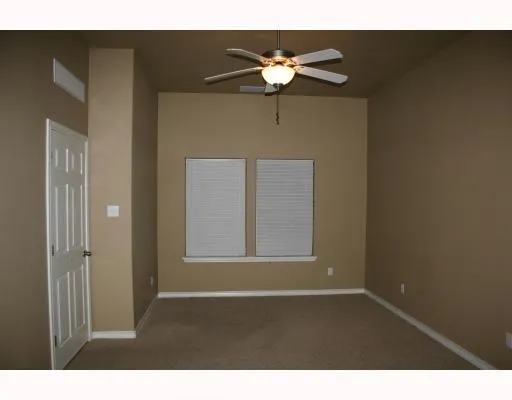 a view of wooden floor in a livingroom