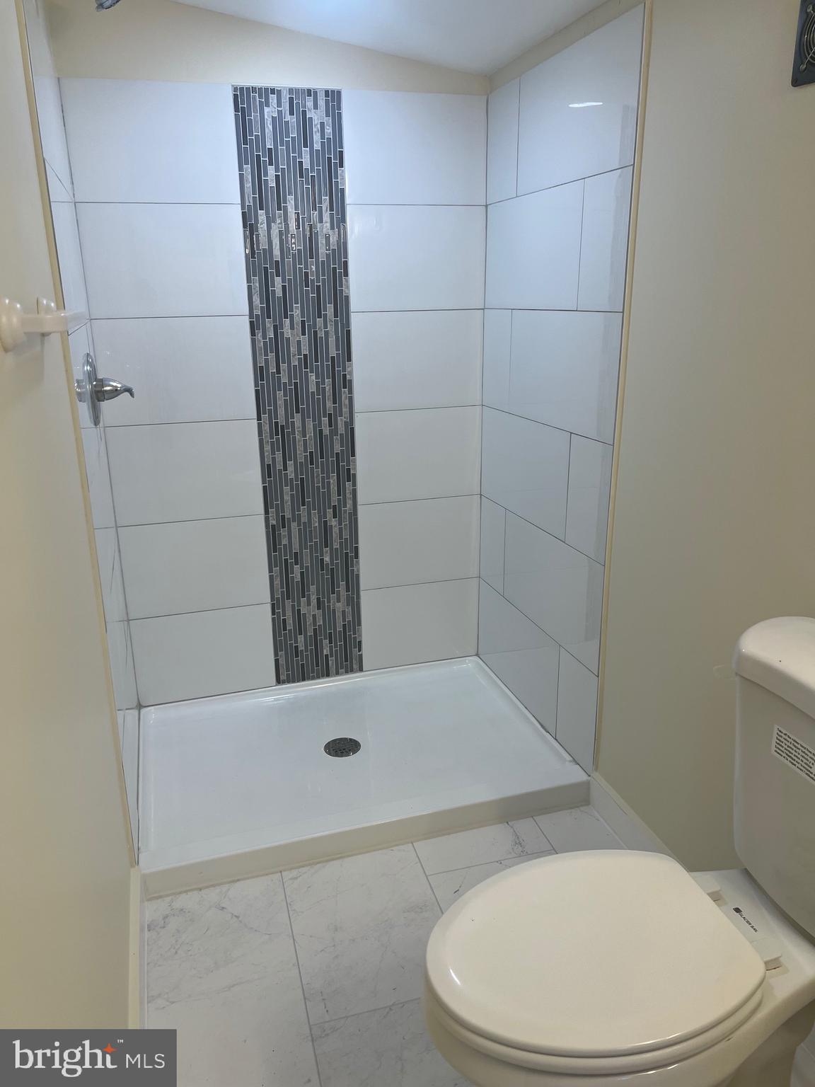 5732 Bugler Street Capitol Heights, MD 20743 - Photo 13 of 23 a bathroom with a toilet and shower
