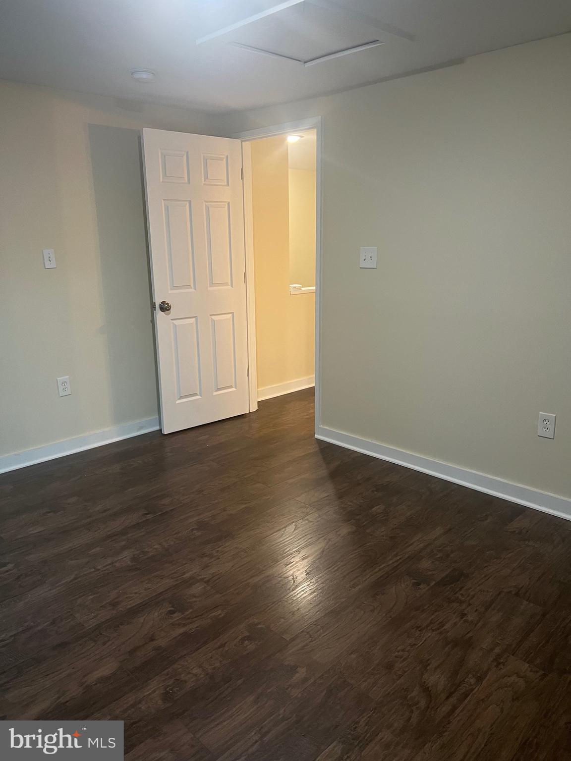 5732 Bugler Street Capitol Heights, MD 20743 - Photo 9 of 23 an empty room with wooden floor and windows