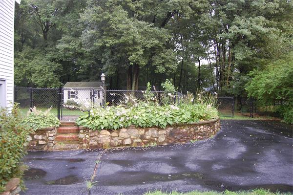 11 Short Street Canton, MA 02021 - Photo 2 of 30 a view of a garden with plants and large trees