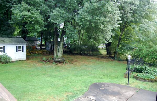 11 Short Street Canton, MA 02021 - Photo 25 of 30 a backyard of a house with lots of green space