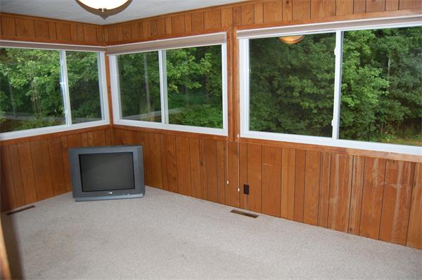11 Short Street Canton, MA 02021 - Photo 8 of 30 an empty room with wooden floor and windows