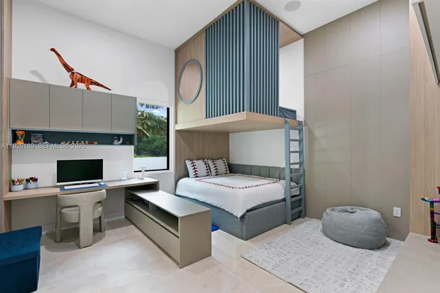 a bedroom with a bed and a fireplace