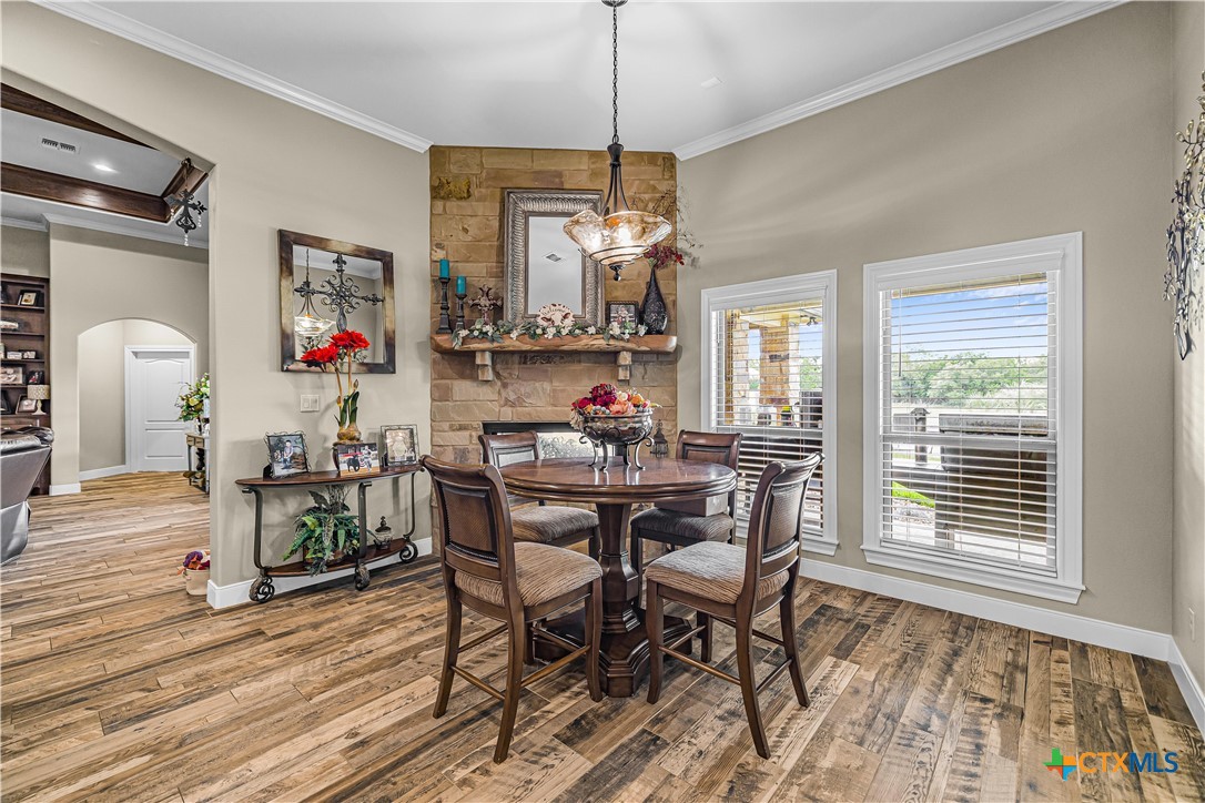 254 Sendera Loop Victoria, TX 77904 - Photo 23 of 48 a dining room with furniture window wooden floor