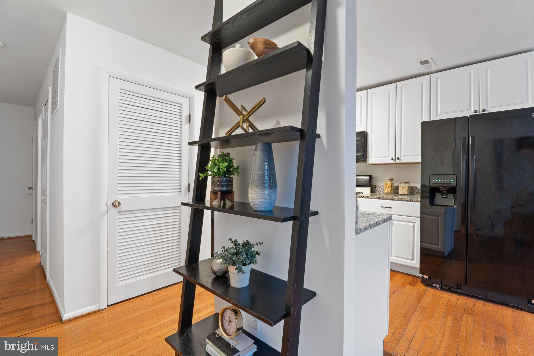 36 Q Street Northwest Washington, DC 20001 - Photo 25 of 40 a kitchen with stainless steel appliances granite countertop a refrigerator and a stove top oven
