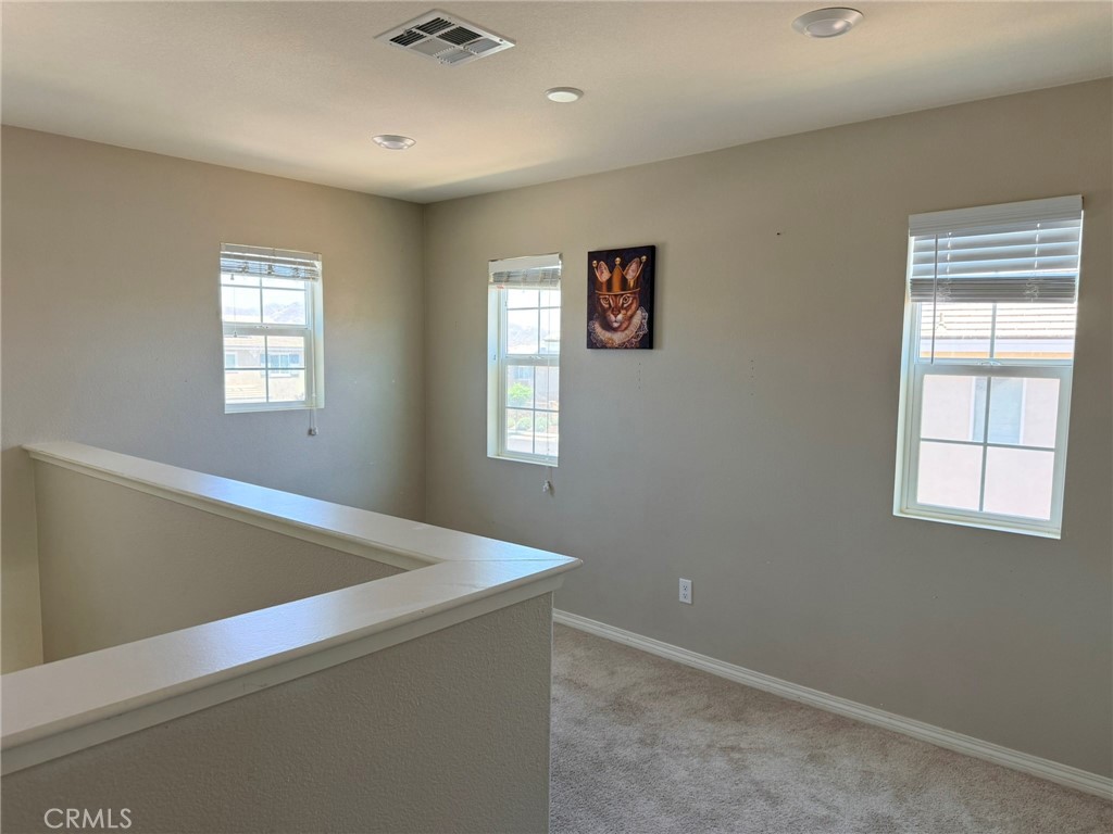 32201 Rambling Court Winchester, CA 92596 - Photo 8 of 11 a view of empty room with window