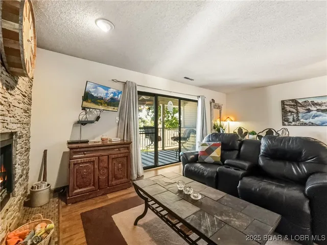 $215,000 | 28 Eleven W Court, Unit 2B, Sunrise Beach, MO 65079