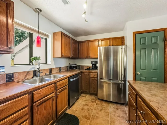 $215,000 | 28 Eleven W Court, Unit 2B, Sunrise Beach, MO 65079