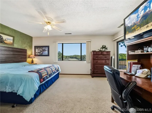 $215,000 | 28 Eleven W Court, Unit 2B, Sunrise Beach, MO 65079