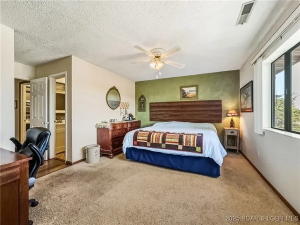 $215,000 | 28 Eleven W Court, Unit 2B, Sunrise Beach, MO 65079