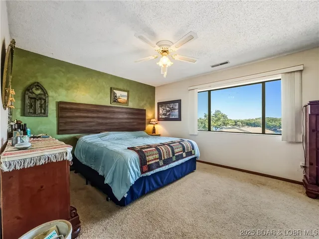 $215,000 | 28 Eleven W Court, Unit 2B, Sunrise Beach, MO 65079