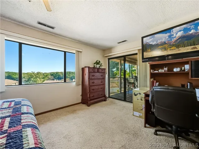 $215,000 | 28 Eleven W Court, Unit 2B, Sunrise Beach, MO 65079