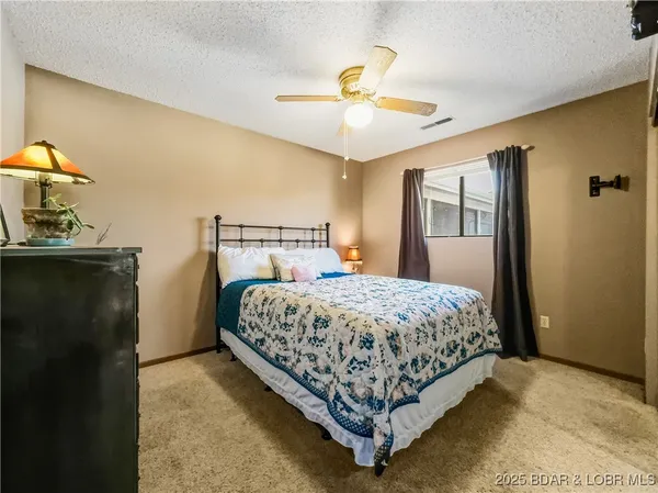 $215,000 | 28 Eleven W Court, Unit 2B, Sunrise Beach, MO 65079
