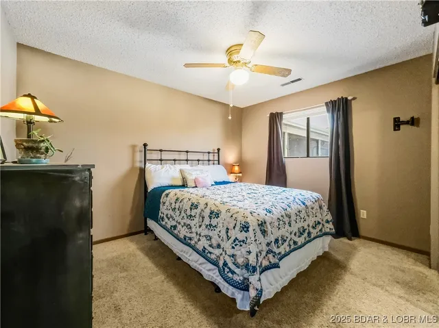 $215,000 | 28 Eleven W Court, Unit 2B, Sunrise Beach, MO 65079