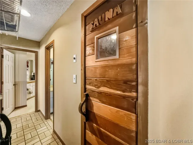 $215,000 | 28 Eleven W Court, Unit 2B, Sunrise Beach, MO 65079