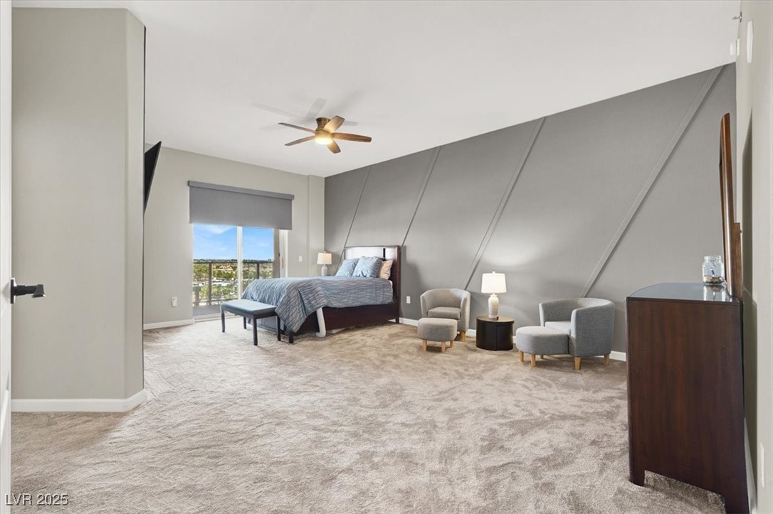 8255 South Las Vegas Boulevard, Unit 722 Las Vegas, NV 89123 - Photo 23 of 40 Bedroom featuring carpet flooring and a ceiling fan
