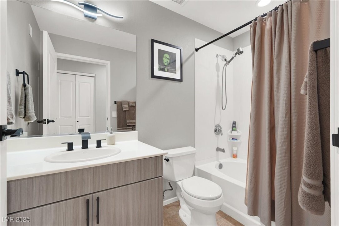 8255 South Las Vegas Boulevard, Unit 722 Las Vegas, NV 89123 - Photo 34 of 40 Full bath featuring shower / bath combo, vanity, and tile patterned floors