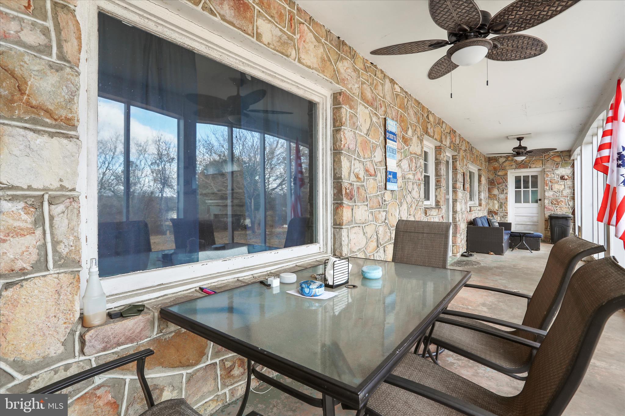 425 West 15th Street Front Royal, VA 22630 - Photo 38 of 47 a dining room with furniture and a floor to ceiling window