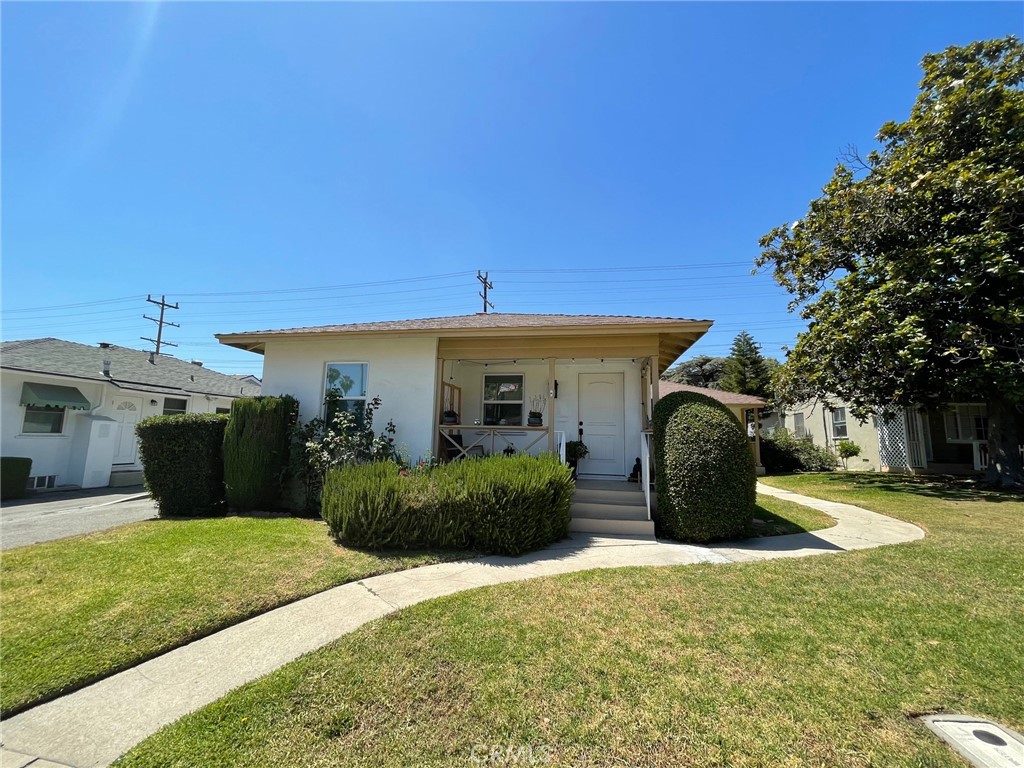 1125 North Verdugo Road Glendale, CA 91206 - Photo 1 of 7 a front view of a house with garden